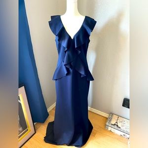 Navy blue lined formal dress.  Forms comfortably to fit with in a shapely manor.